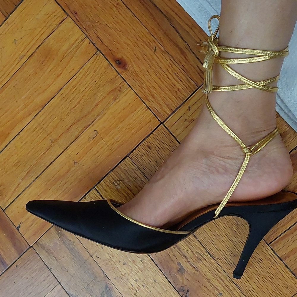 YSL Vintage Black satin shoe with gold wrap around the ankle straps.